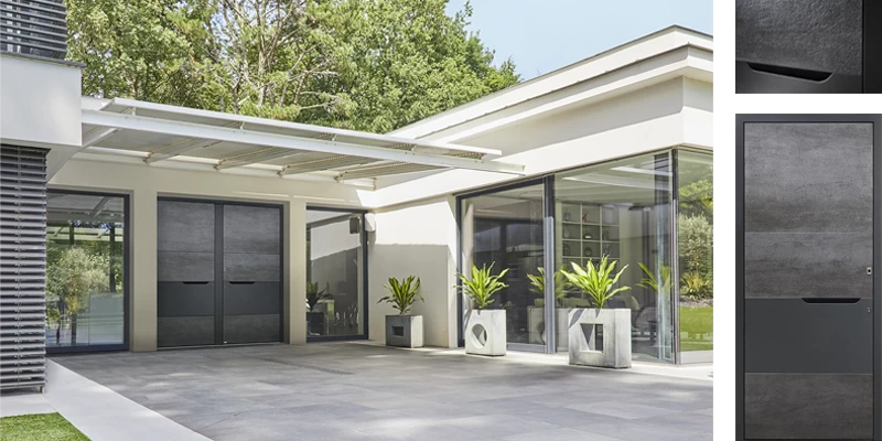 porte d'entrée graphite en aluminium sur une façade de maison contemporaine