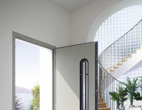 porte d'entrée gris clair contemporaine dans une maison moderne